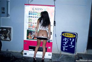 Horny Asian amateur exhibitionist wife flashing on the street