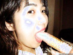 Japanese amateur wife opens her shave mature pussy and puts a dildo