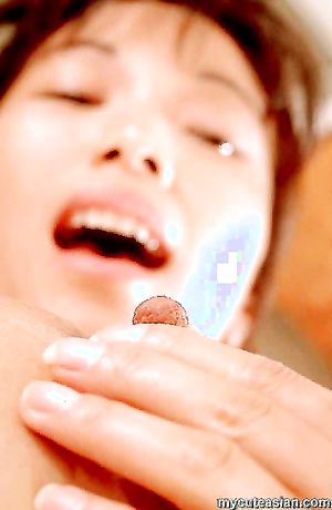 Horny asian with large nipples spreads her pussy in kitchen