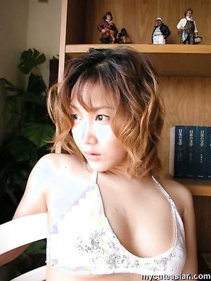 Here is my busty Japanese wife posing nude for my cute asian
