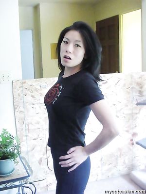 Busty Asian Amateur shares some photos of her sucking hard