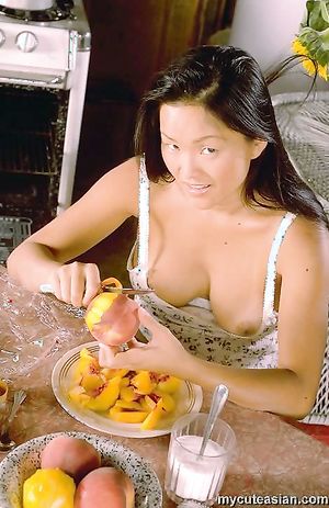 Long haired Asian beauty strips and opens wide her tight twat