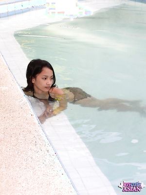 Young asian babe sucks her boyfriend cock and gets a big load