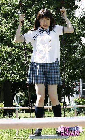 Japanese coed in uniform shows her tight virgin pussy here