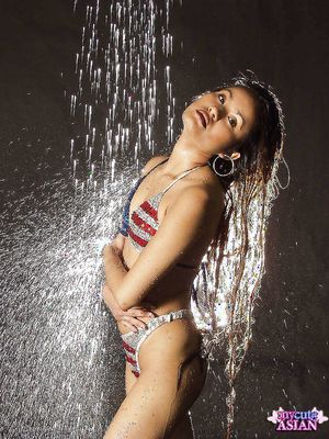 Thai bitch shows American solidarity with her two-piece bikini