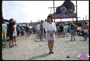 Busty amateur asian beauty shows her tight pussy in forest