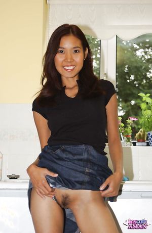Long haired Asian Amateur spreads her wet pussy in her kitchen