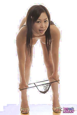 Pretty naughty asian showing her pussy and playing with dildo