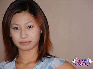 Amateur chinese babe in white panties shows her pink pussy