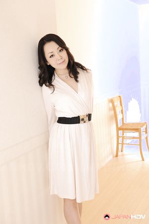 Asian Yuna Yamami plays with big boobs and spreads the pussy labia.