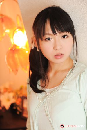 Sexy Nozomi Hazuki looks thoughtful and sweet while posing at home.