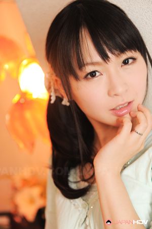 Sexy Nozomi Hazuki looks thoughtful and sweet while posing at home.