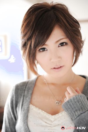 Asian Kaede Oshiro with busy mouth shows sexy legs in hot photos.