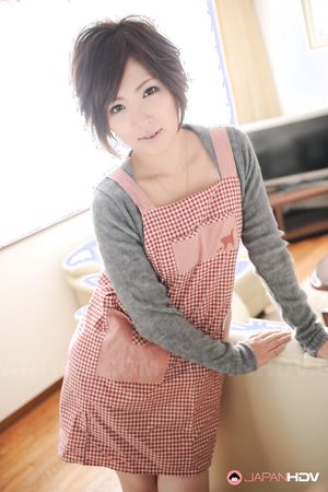 Asian Kaede Oshiro with busy mouth shows sexy legs in hot photos.