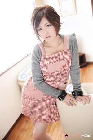 Asian Kaede Oshiro with busy mouth shows sexy legs in hot photos.