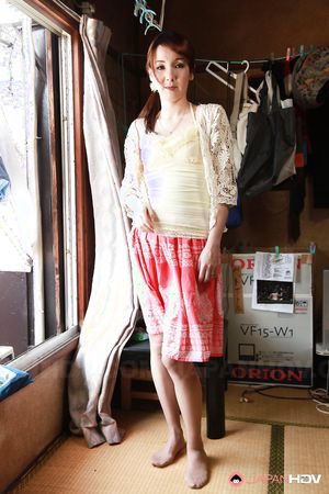 Asian Chika Sasaki strips to show round boobs and hairy love box.