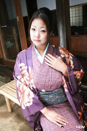 Sweet brunette in a purple kimono wants to show her fine twat