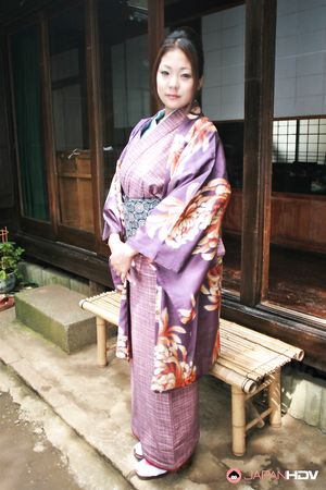 Sweet brunette in a purple kimono wants to show her fine twat