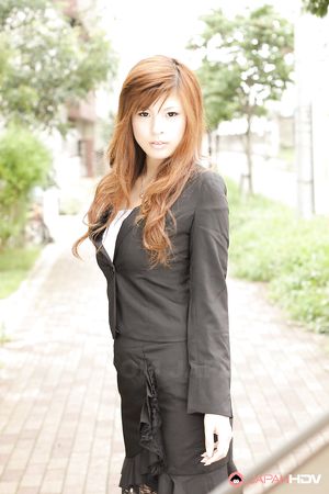 Stunning redhead office lady Rina Kikukawa posing outdoors with joy