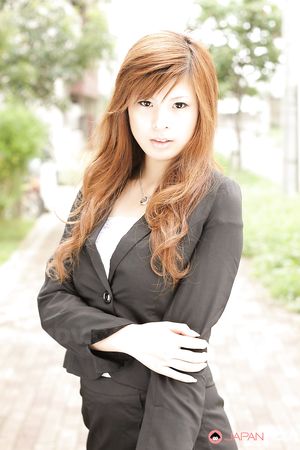 Stunning redhead office lady Rina Kikukawa posing outdoors with joy