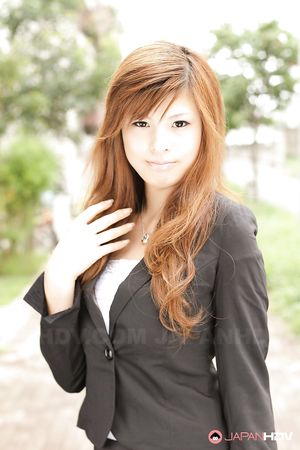 Stunning redhead office lady Rina Kikukawa posing outdoors with joy
