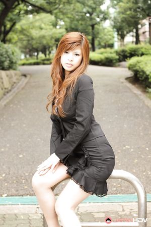 Stunning redhead office lady Rina Kikukawa posing outdoors with joy