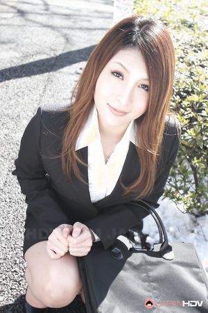 Sweet office lady in a sexy suit Rara Mizuki posing outdoors with joy