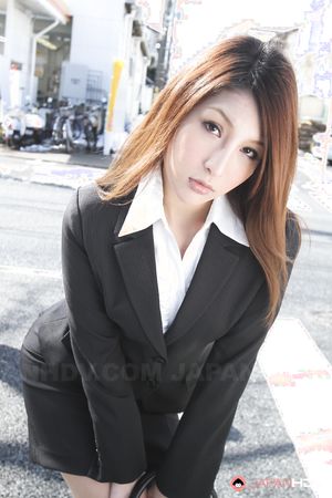 Sweet office lady in a sexy suit Rara Mizuki posing outdoors with joy