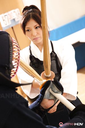 Beautiful girl Jun Sena showing her boobs during a Kendo workout