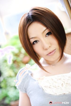 Short haired brunette wife Hiromi Tominaga shows off her body outdoors