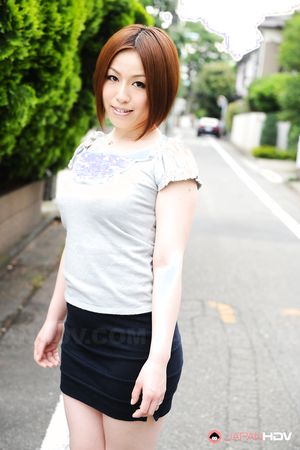 Short haired brunette wife Hiromi Tominaga shows off her body outdoors