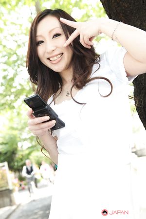 Long haired brunette Asuka Souma shows her beautiful body outdoors