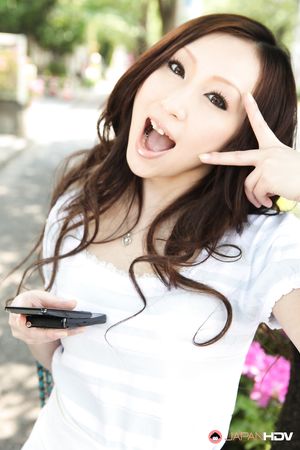 Long haired brunette Asuka Souma shows her beautiful body outdoors
