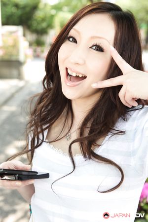 Long haired brunette Asuka Souma shows her beautiful body outdoors