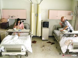 Caged Japanese beauty is ready to suck a huge pecker with pleasure