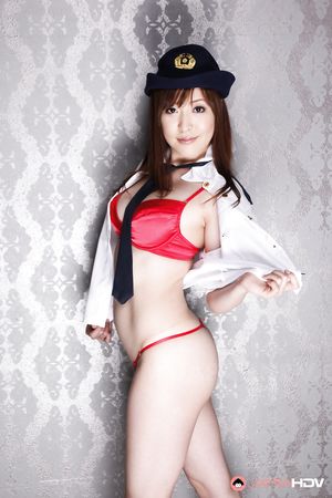 Elegant police officer Akane Satozaki shows her natural boobies
