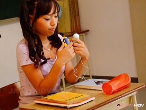 Cute schoolgirl Nagisa drills her cunt with passion in the classroom