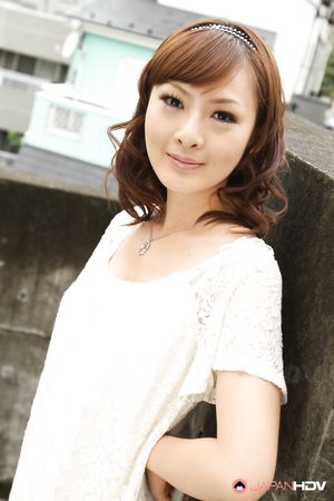 Adorable Japanese lady Fujii showing off her natural tits with pride