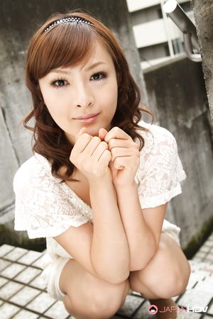 Adorable Japanese lady Fujii showing off her natural tits with pride