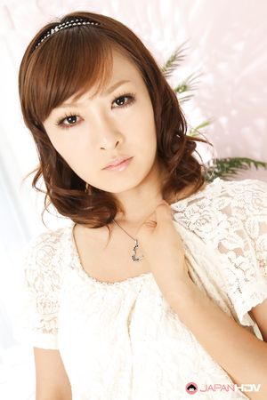 Adorable Japanese lady Fujii showing off her natural tits with pride