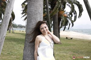 Super hot Japanese lady Manami Ichikawa shows off on the beach