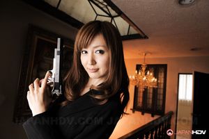 Slutty police officer Yui Igawa posing with her gun, she's so hot