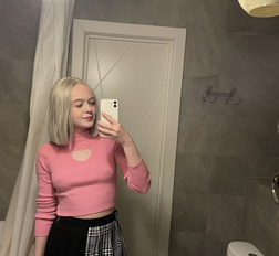 Tattooed blonde showing off her sexy tattoos