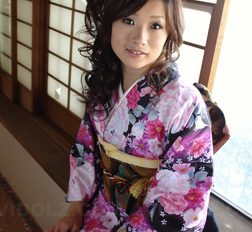 Chiaki in kimono spreads legs and shows hairy pussy on the floor.