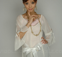 Hot Akane Hotaru in white blouse, shorts and high heels loves posing.