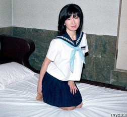 Lovely japanese coed in uniform spreads her tight trimmed pussy here
