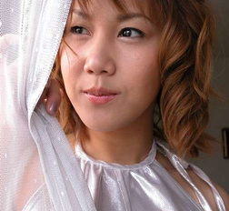 Busty japanese wife spreads her legs to show her hairy pussy