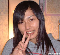 Shy Japanese amateur coed shows her tight hairy pussy here