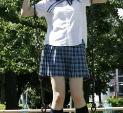 Japanese coed in uniform shows her tight virgin pussy here