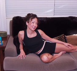 Hot MILF asian babe is putting a dildo in her tight asshole